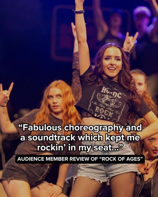 A dancer with arms raised in a rock T-shirt, with an audience quote